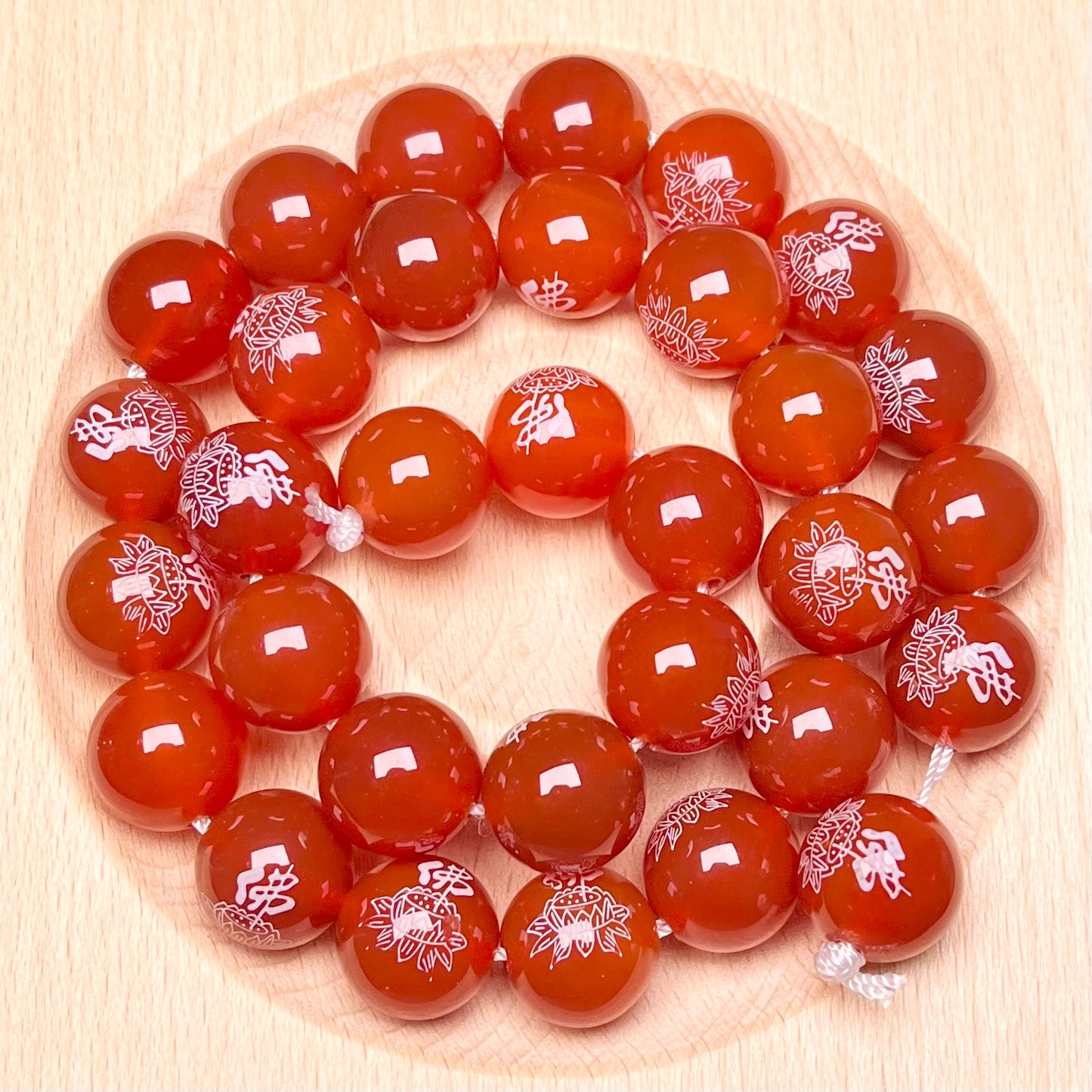 Carnelian stamp Buddha character bead strand 12mm